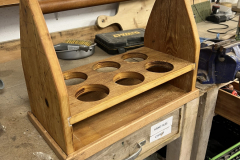Wine-carrier-in-workshop-scaled